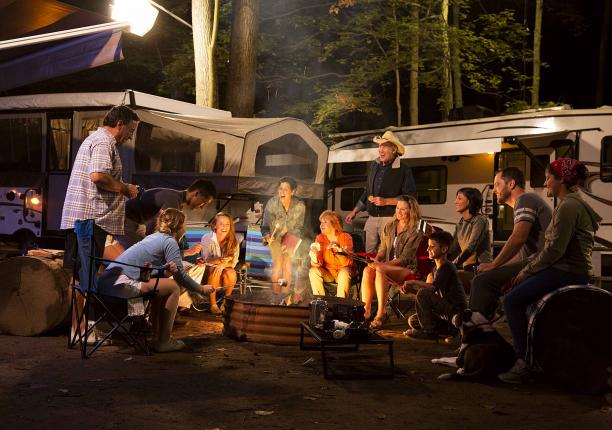 RVs and People around campfire RVs and People around campfire